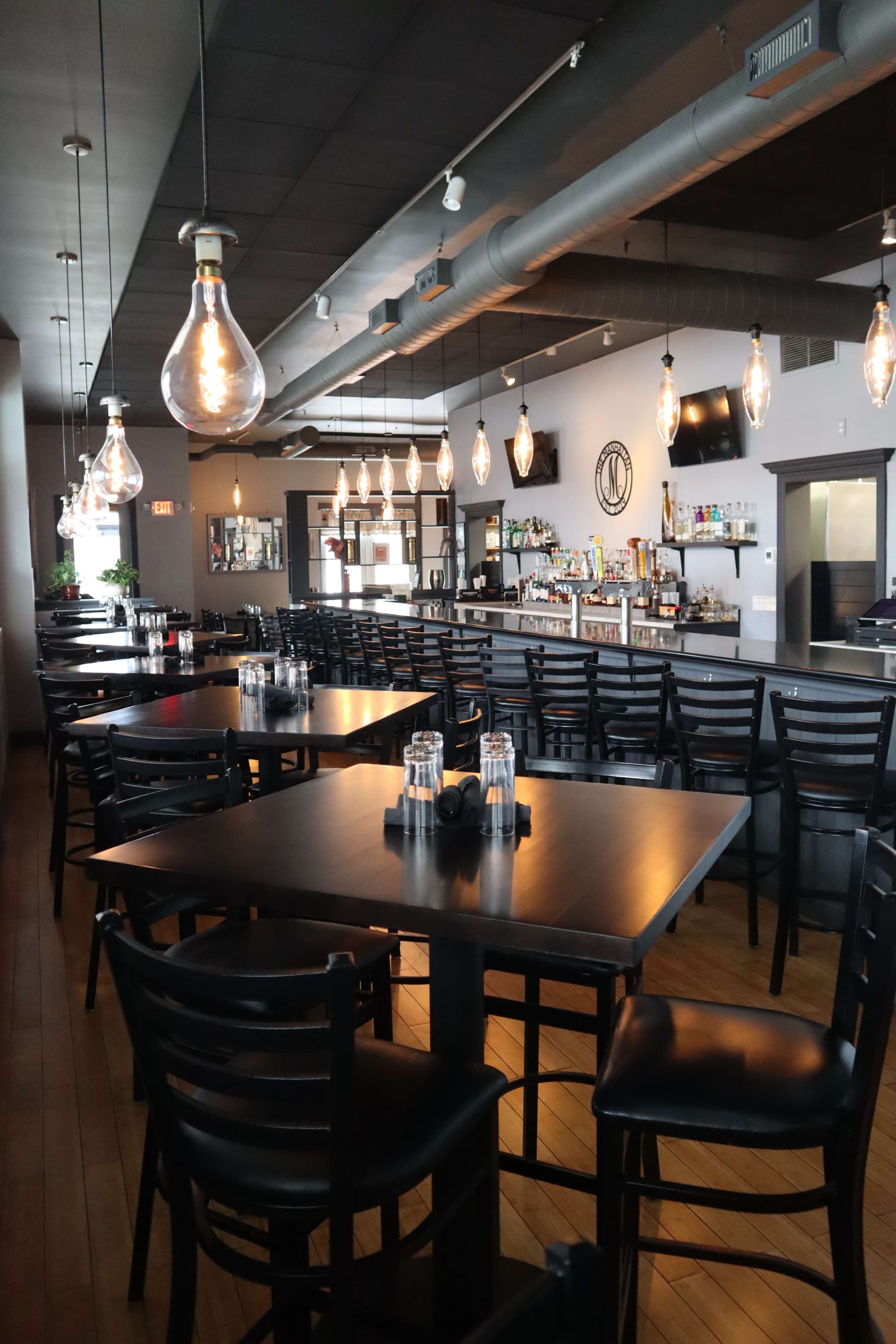 The Manhattan restaurant interior with bar and dining area