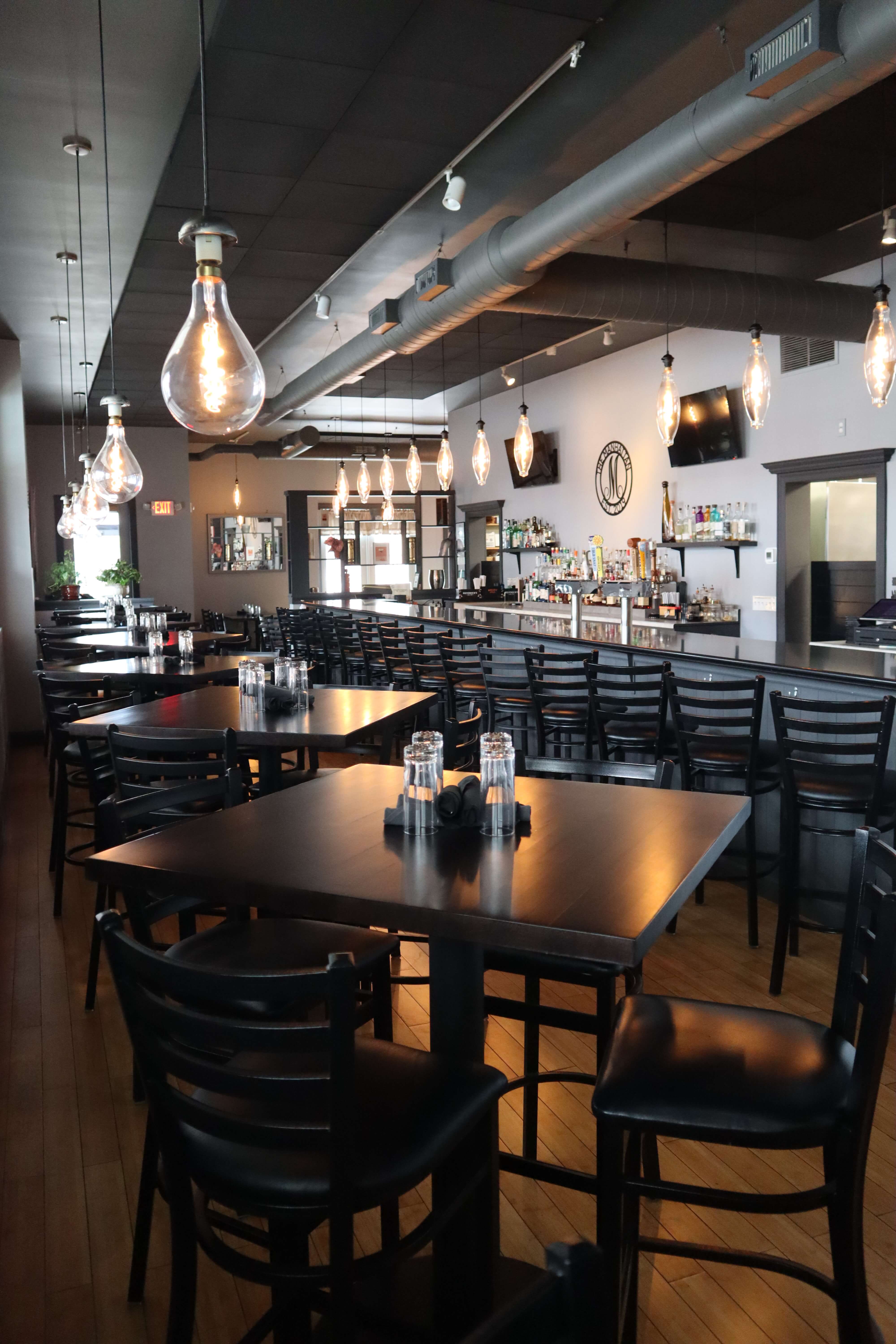 The Manhattan restaurant interior with bar and dining area